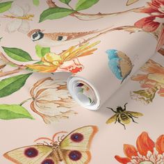 a wallpaper with butterflies and flowers on it's side, next to a roll of tape