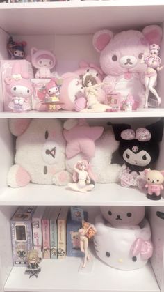 there are many stuffed animals on the shelves