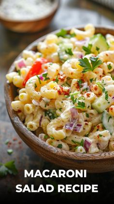 macaroni salad in a wooden bowl on a table