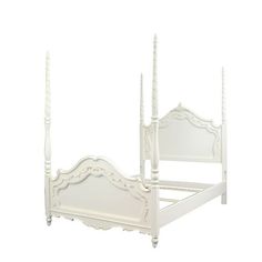 a white bed frame with four posts and headboard, on a white background photo