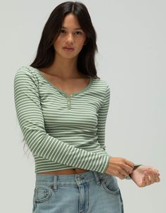 Rsq Striped Long Sleeve Henley. This Stripe Long Sleeve Henley Combines Casual Comfort With Classic Style. Featuring A Buttoned Henley Neckline And A Timeless Striped Pattern, It Offers A Flattering Fit That's Perfect For Everyday Wear. Made From Soft, Breathable Fabric, This Top Is Ideal For Layering Or Wearing On Its Own, Adding A Touch Of Laid-Back Charm To Any Outfit.66% Rayon, 29% Polyester, 5% Spandex. Hand Wash. Imported. Model Is Wearing A Size Small. Model Measurements:height: 5'7" Bust Patterned Long Sleeve Shirt, Long Sleeve Button Up, Cute Tops Long Sleeve, Striped Long Sleeve Shirt Outfit, T Shirts For Women Casual, Henley Top Outfit, Cute Long Sleeve Tops, Casual Everyday Outfits, Long Sleeve Shirt Women