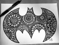 a drawing of a bat with intricate patterns on it and a pen next to it