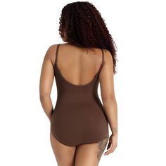 Your collection of dancewear could not be complete without the Camisole Leotard with Adjustable Straps. This best-seller is made of a nylon and spandex combination that is soft and flexible. Adjustable straps ensure a custom fit while the double-stitched seams guarantee long-lasting wear. Offered in multiple colors to match your individualized style. Available in both adult and child sizes. Second-skin Camisole Bodysuit With Built-in Bra, Seamless Stretch One-piece Leotard, Solid Stretch Leotard With Lined Body, Stretch Camisole Leotard With Built-in Bra, High Stretch One-piece Shapewear Bodysuit, High Stretch Seamless Leotard For Swimming, High Stretch Smoothing Leotard For Swimming, Sleeveless Second-skin Leotard Shapewear, Sleeveless Second-skin Shapewear Leotard