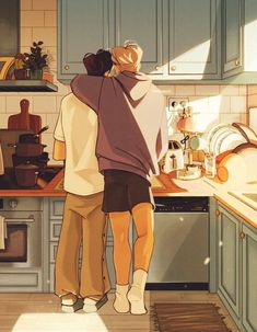 two people standing in a kitchen with their backs to each other