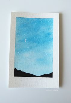 a watercolor painting of the night sky