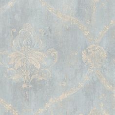 a blue and gold wallpaper with an ornate design