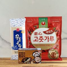 an assortment of snacks on a wooden table