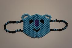 BTS KOYA (RM) inspirierte Maske, handgefertigt mit Pony Perlen. (Hergestellt mit meinem Originalmuster, hellblaue, lila und schwarze Perlen, Ohrbügel haben etwas elastische Dehnung für Komfort). Standardgröße Bitte erlauben Sie 2-3 Werktage für die Bearbeitung, da diese auf Bestellung handgefertigt werden. *Dies ist eine Gesichtsmaske, die als niedliches Konzert-Accessoire getragen werden soll, nicht als Gesundheitspräventionsartikel.* *Bitte vermeiden Sie extreme Hitzeschwankungen, um die Leben Kandi Mask, Costume Mask, Extreme Heat, Pony Beads, A Face, Black Beads, Costume Accessories, Purple And Black, Face Mask