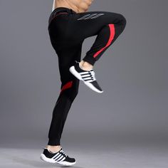 Elevate your workout wardrobe with our high-quality gym fitness clothing. Designed to provide maximum comfort and style, our collection will keep you looking and feeling your best during any workout. Made with breathable materials, our fashionable pieces are perfect for even the sweatiest of sessions. Upgrade your gym wardrobe today! Soccer Pants, Men Sport Pants, Pants Gift, Gym Workout Outfits, Riding Pants, Workout Wardrobe, Football Training, Running Pants, Soccer Training