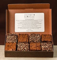 brownies in a box with chocolate sprinkles on the top and bottom