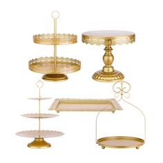 three tiered trays with different designs and sizes on each side, one is gold