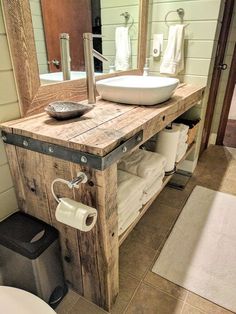 a bathroom with a sink and mirror in it