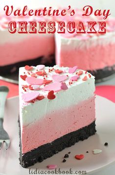 valentine's day cheesecake with pink and white frosting on a cake plate