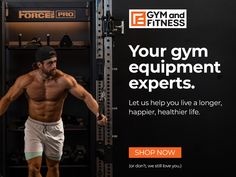 a man with no shirt and shorts is standing in front of a gym equipment rack