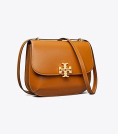 Eleanor Slim Saddlebag: Women's Designer Shoulder Bags | Tory Burch Saddle Crossbody Bag, Tory Burch Purse, Womens Designer Handbags, Leather Saddle Bags, Tory Burch Handbags, Designer Crossbody Bags, Designer Shoulder Bags, Brown Bags, Saddle Bag