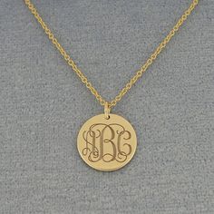 "*Disc Circle Size : 1/2 Inch (1.2 cm) X 1/2 Inch (1.2 cm). *Pendant Thickness: 0.7 mm / 22 Gauges / 0.028\". *Metal : 10kt or 14kt Solid White or Yellow Gold. *Chain : Optional (1.0 mm (Gauge 25) Rollo chain 16, 18 or 20 inch). *Premium high end quality fine solid 10kt or 14kt yellow or white gold with high polished finish and deeply engraved 3 initial monogram and cut out by latest technology laser machine, top quality guaranteed. *Made in USA, ships from Los Angeles CA, USA. *These monogram j Classic Yellow Gold Monogram Necklace, Classic Monogram White Gold Necklace, Monogram Medallion Necklace For Anniversary, Classic Monogram Medallion Jewelry, Anniversary Monogram Medallion Necklace, Classic Round Disc Jewelry With Initials, Formal Round Monogram Jewelry, Gold Monogram Medallion Jewelry, Yellow Gold Monogram Medallion Necklace