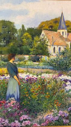 a painting of a woman standing in a field of flowers with a church in the background