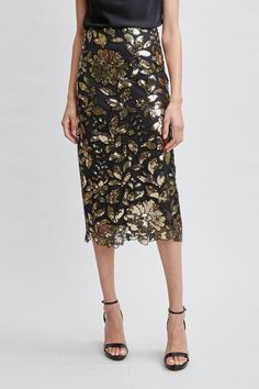 Shine on! All eyes will be on you as you walk into the room in this sequined mesh floral midi skirt. It features a scalloped hem to follow the floral motif. Pair it with its matching sequin halter top or with one of our cashmere blend sweaters for a casual chic vibe. Floral Sequin Midi Skirt 100% Polyester Runs true to Size Model is 5'9" and wearing size 4 Dry Clean Only Imported Style #: ETR44359 Sequin Halter Top, Sequin Midi Skirt, Sequin Halter, Cashmere Blend Sweater, Floral Midi Skirt, Long Sleeve Short Dress, All Eyes, Shine On, Scalloped Hem