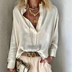 Gold V-neck Blouse For Work, Versatile Beige V-neck Blouse, Cream V-neck Top For Work, Versatile Beige V-neck Top, Beige V-neck Solid Color Blouse, Beige V-neck Solid Blouse, Beige V-neck Blouse Solid Color, Beige Solid Color V-neck Top, Beige V-neck Blouse For Fall