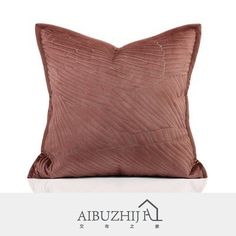 a brown pillow sitting on top of a white table