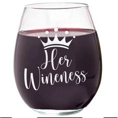 a wine glass with the words her wineness written on it