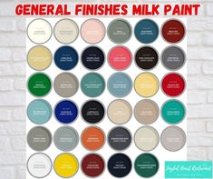 the color scheme for general finishes milk paint on a white brick wall with red lettering