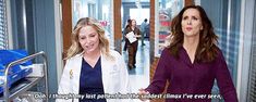 two women in scrubs walking down a hospital hallway with the caption that says, i'm not going back to work