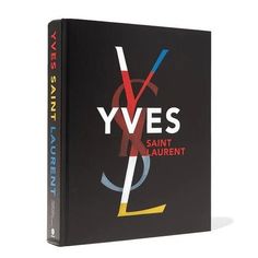 a book with the title yve's saint laurent written in blue and red