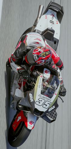 a person riding a motorcycle on a race track