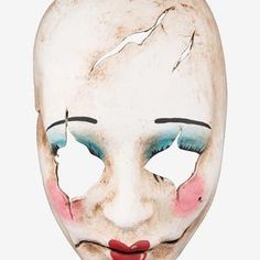 a creepy mask with blue eyes and red lips is shown in this image, it appears to be painted white