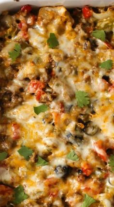 a casserole dish filled with meat and vegetables