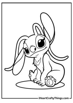 a cartoon rabbit sitting on the ground