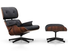 the eames lounge chair and ottoman is shown in black leather with wood trimming