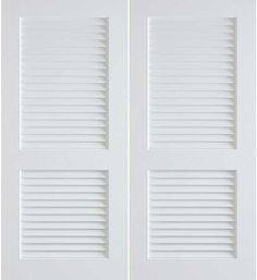 two white doors with shutters on each side