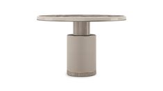 a round table with a metal base on an isolated white background for use in interior design