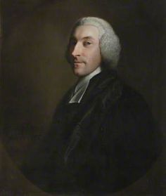 an old portrait of a man with white hair wearing a black coat and gray tie