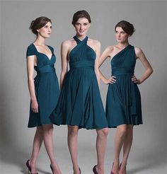 three beautiful women in purple dresses posing for the camera with their hands on their hips