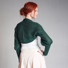 This dark green bolero is made of soft mohair yarn. This bolero has long sleeves. It will look good with any type of clothing, it will be amazing with any type of bridal and bridesmaids dress and will keep your shoulders warm. This bolero available also in other colors. for size S Underarm 44 cm = 17.1 in Sleeve width at top (lying flat-unstretched): 44 cm = 17.1 in Sleeve length on inside seam: 50 cm = 19.7 in Sleeve width under elbow 24 cm = 9.4 in (unstretched) Sleeve width at hem: 16 cm = 6. Elegant Fall Wedding Cardigan, Elegant Long Sleeve Cropped Sweater, Elegant Cropped Sweater For Spring, Elegant Fitted Cropped Sweater For Fall, Fitted Wrap Shrug For Fall, Elegant Spring Wrap Shrug, Fitted Winter Cropped Sweater For Party, Fitted Cropped Sweater For Winter Party, Chic Evening Winter Shrug