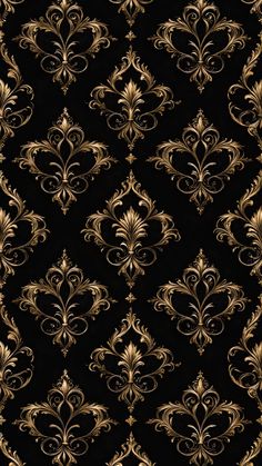 a black and gold wallpaper with an ornate design