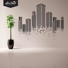 a potted plant in front of a city skyline wall decal