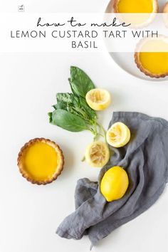 lemon custard tart with basil on a white table next to other food