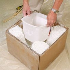 a man is pouring sugar into a bucket