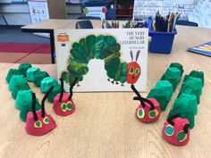 the very hungry caterpillars are ready to be read by their teacher at school