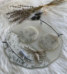 some scissors and other items on a plate