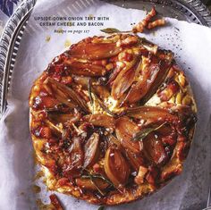 an image of a pizza on the cover of cooking with olives and bacon cookbook