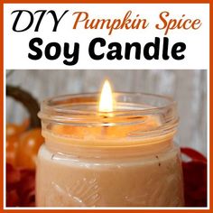 a pumpkin spice soy candle sitting on top of a table