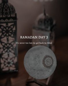 the ramadan day 3 message is displayed in front of an illuminated lamp and lantern