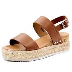 PRICES MAY VARY. Jute platform pairs beautifully with leather, all while elevate your body height to your look. The comfortable wedge sandals with wide straps add a modern contrast and slip seamlessly into your streamlined lifestyle Adjustable ankle strap buckle and elastic strap can steadily embrace your ankle to prevent slippage. Wear them as you stroll along the sunny streets for a breezy, chic appearance. Soft cork cushioned footed and comfortable slope curves ensure maximum comfort through Brown Platform Sandals For Vacation, Brown Platform Sandals For Outings, Adjustable Brown Platform Sandals, Brown Platform Sandals Medium Width, Brown Platform Open Toe Sandals, Comfortable Wedges Sandals, Womens Espadrilles Wedges, Women's Espadrilles, Outdoor Sandals