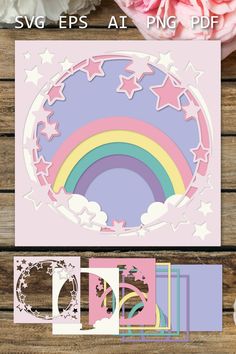 paper crafting kit with pink flowers, stars and rainbows in the sky on wooden background