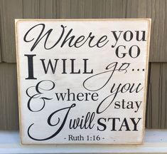 a wooden sign that says, where you will go and where you will stay ruth 11 16